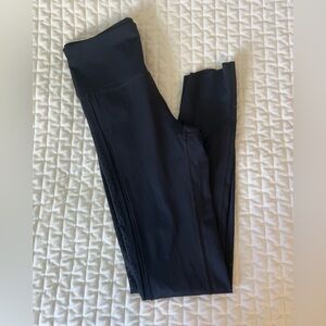 - Under Armour fitted compression leggings raw hem women’s